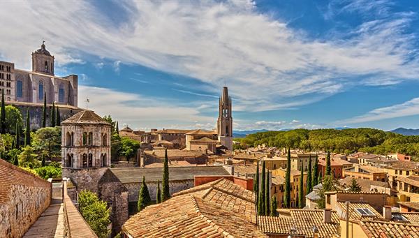 The medieval city of Girona with the Cathedral of Santa María and the Church of San Feliu in Catalonia, Spain.
