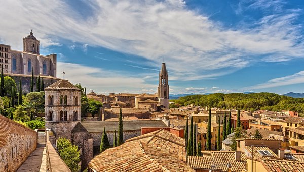 The medieval city of Girona with the Cathedral of Santa María and the Church of San Feliu in Catalonia, Spain.
