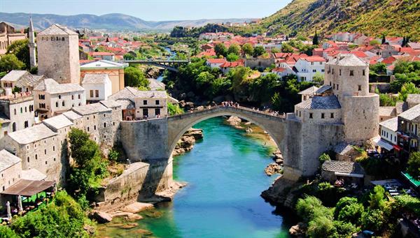 Mostar: Two cultures divided by one river…. or….. united by a bridge??