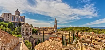 The medieval city of Girona with the Cathedral of Santa María and the Church of San Feliu in Catalonia, Spain.
