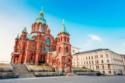 Uspenski Cathedral, Helsinki on the hill on a sunny summer day. Red Church - Tourist destination in the Finnish capital.

